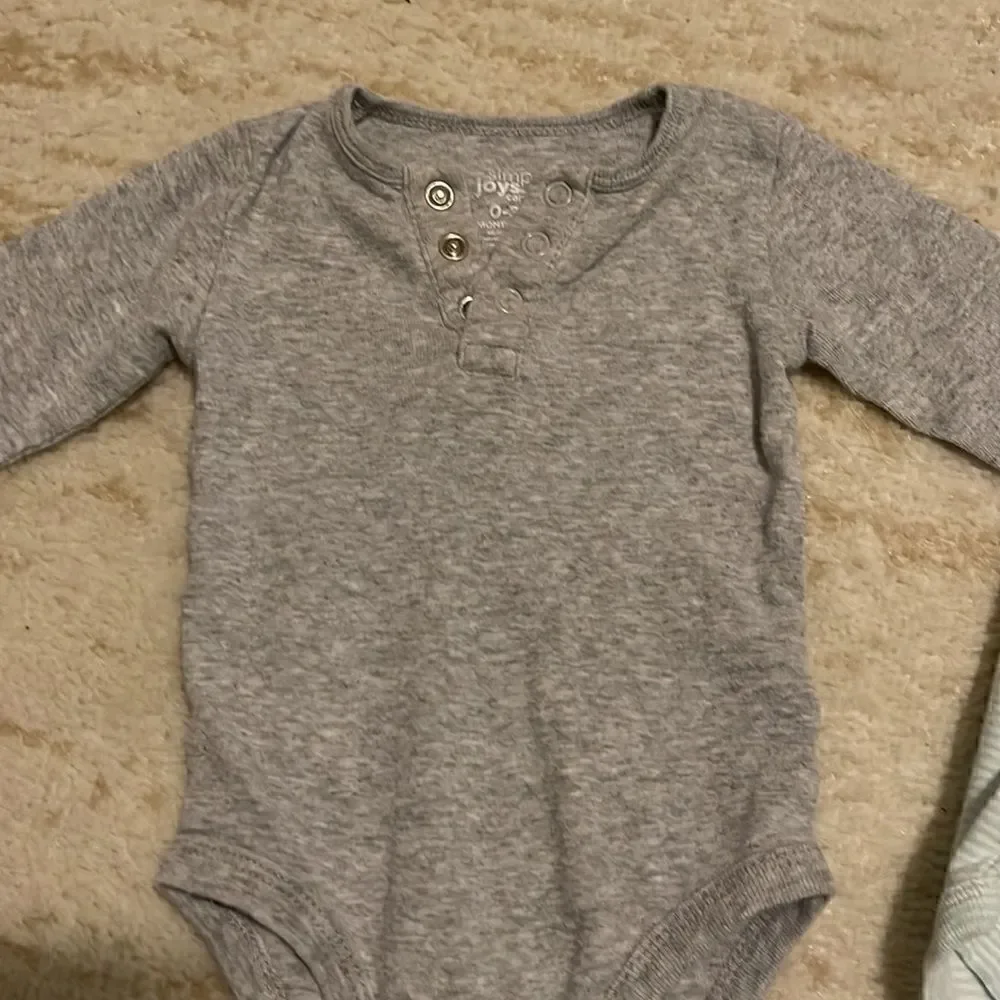 Bundle of five 0-3 month long sleeve shirt onesies